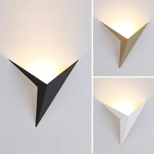 Modern elegant triangular led wall lamp with geometric design available in black gold and white for bedroom study decorbites elegant triangular wall lamp