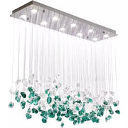 Modern emerald and clear glass stone chandelier with sleek chrome frame and cascading crystal droplets for dining room decorbites glass stone decor
