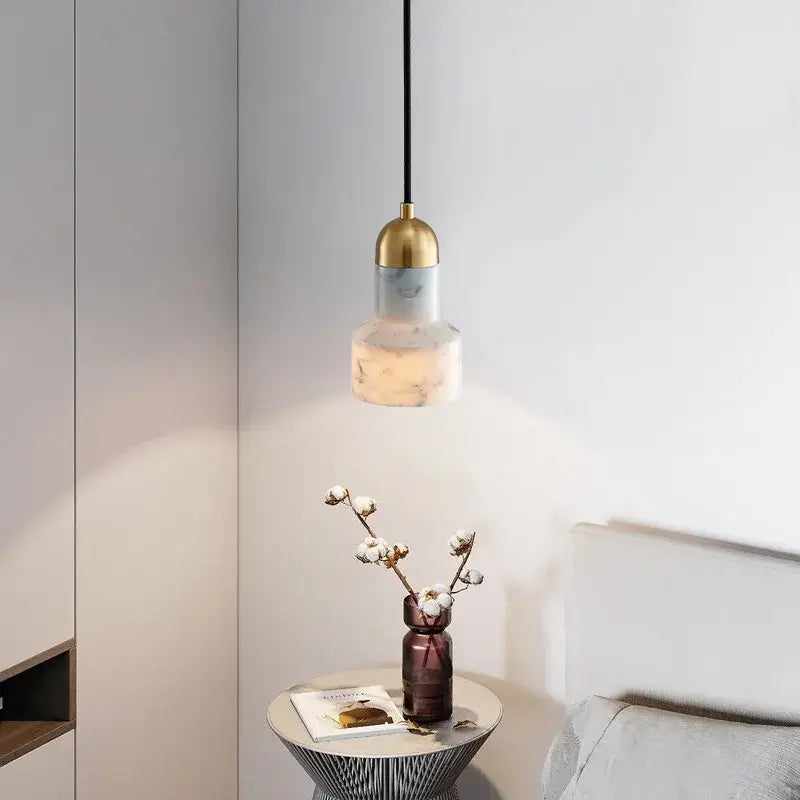Modern emerald green and brass led pendant lamp with gold-toned metal top and marbled glass shade for dining room
