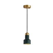A modern emerald green ceramic led pendant lamp with polished brass accents ideal for dining room lighting
