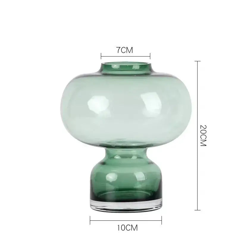 Modern emerald green translucent glass gourd vase with rounded bulbous body and matching base for living room decor