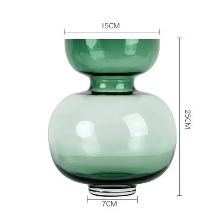 A sleek two-tiered green gourd vase made of glass with a narrow neck for modern living room terrarium use