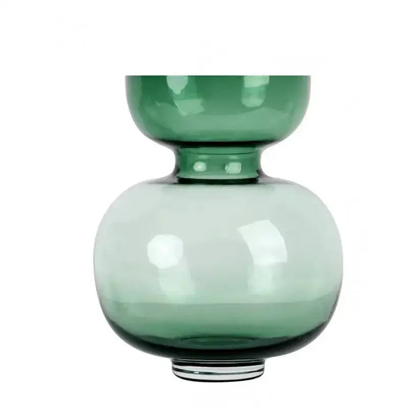 A sleek two-tiered modern emerald green gourd vase made of glass with a subtle gradient for living room decor