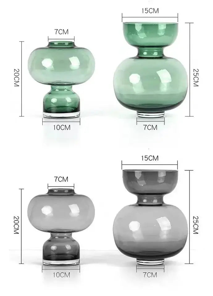Modern emerald green gourd vase set featuring two glass vases in translucent green and smoky gray with elegant curves