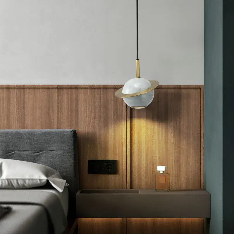 Modern emerald green marble led pendant lamp featuring a white marble globe and gold-toned ring pendant light