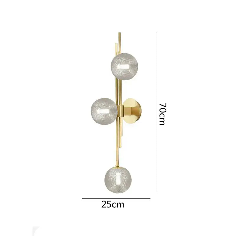 Modern emerald green white glass ball wall lamps featuring a gold-toned wall sconce with three frosted glass spheres