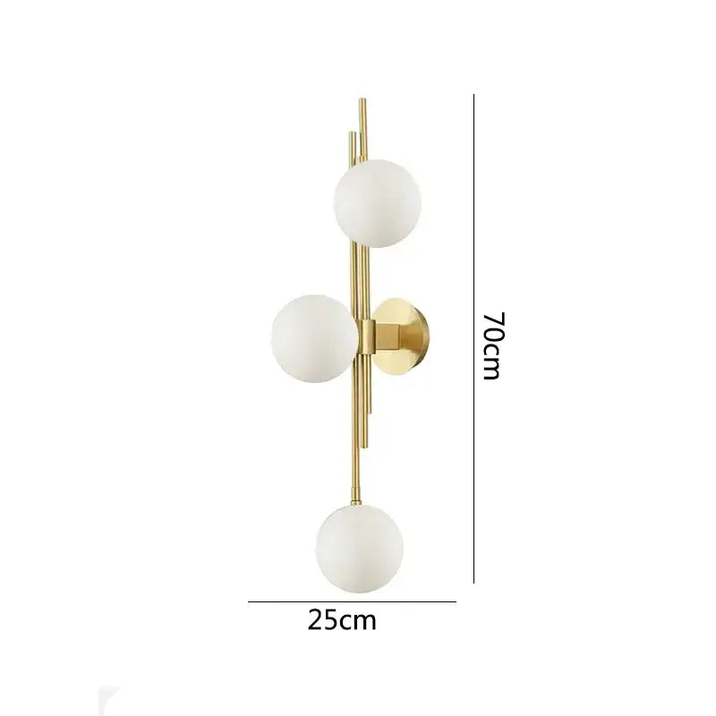 Modern emerald green white glass ball wall lamps featuring a gold-toned wall sconce with three frosted white glass shades