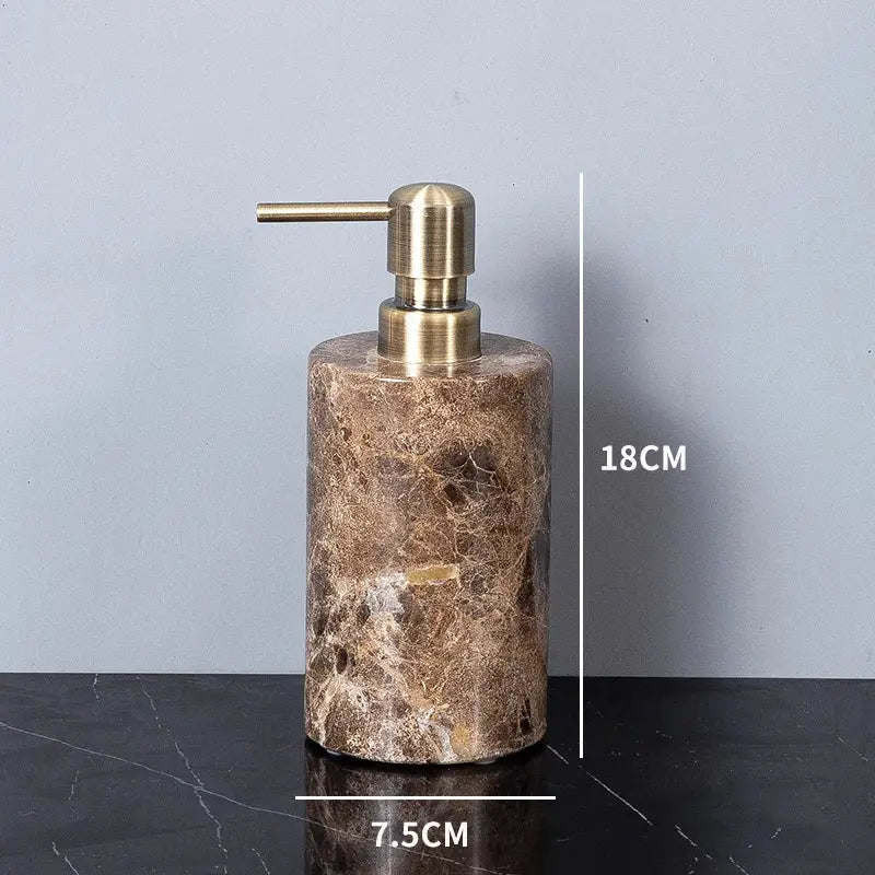 A sleek 18cm soap dispenser with emperador dark marble body and antique brass pump from modern bathroom set