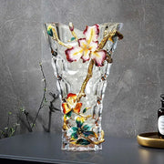 Clear crystal glass vase with colorful enamel flowers and gold-toned branches for modern living room decor