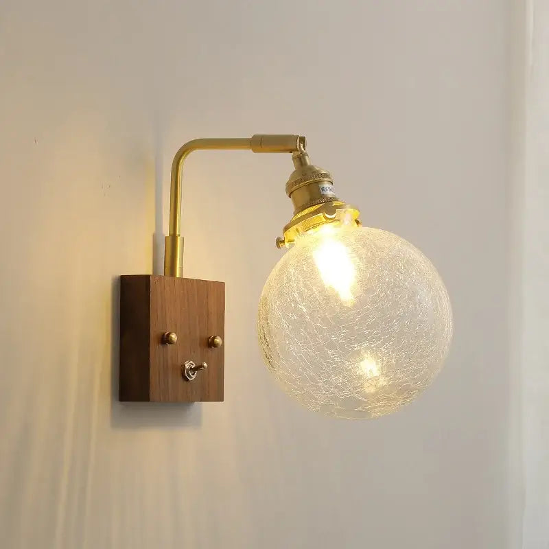Brass-finished wall lights with crackled glass globe wooden base and toggle switches for bedroom glass copper led wall use