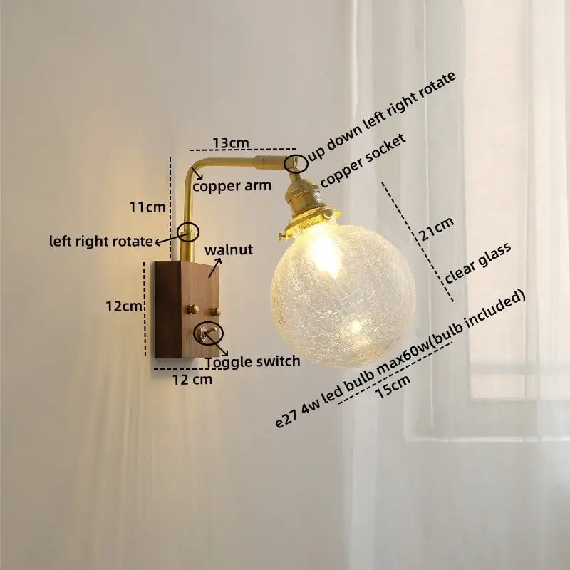A warm-toned glass copper led wall light with walnut base and adjustable arm for bedroom sconce lighting