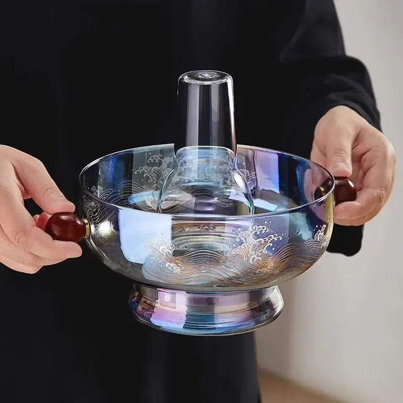 Modern etched decorbites glass hotpot in translucent blue with iridescent wave patterns and red wood handles holding glass container