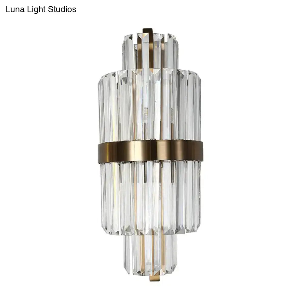 Modern faceted crystal bronze wall light with clear crystal prism and brass accents two lights for bedroom use