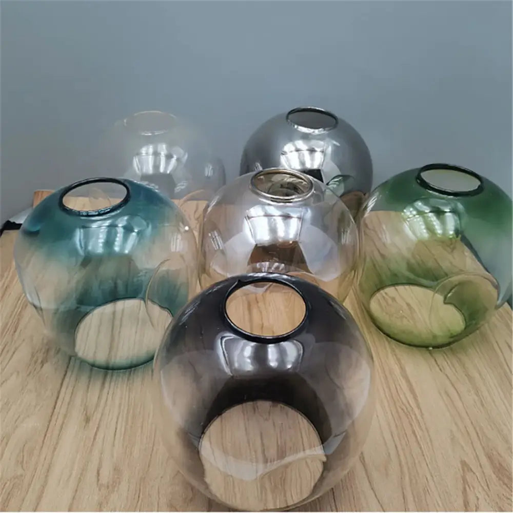 Modern faceted glass shade replacement for living room lamp cover in teal silver and green with black-rimmed openings
