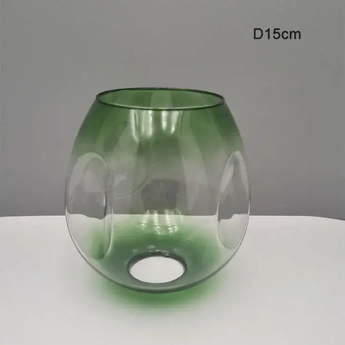 Modern faceted translucent green glass shade replacement with bulbous shape and embossed patterns for living room lamp cover