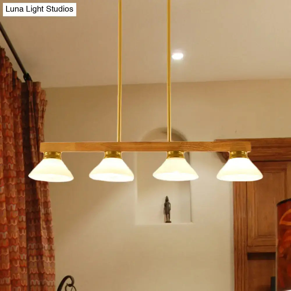 DecorBites™ nordic style linear pendant light with warm brass finish wooden cone shade and frosted glass for kitchen island