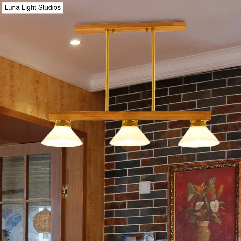 DecorBites Nordic style wooden cone shade linear pendant light with three frosted glass shades and brass accents