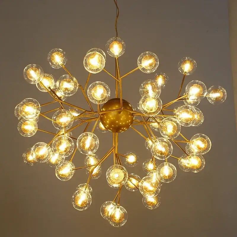 Modern firefly glass round ball chandelier with golden spherical metal and clear glass globe bulbs for dining room decorbites heracleum firefly