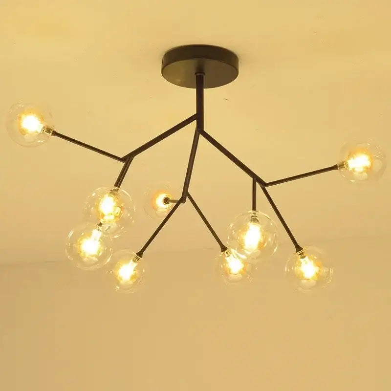 Black metal modern firefly glass round ball chandelier with multiple clear globe bulbs for dining room lighting