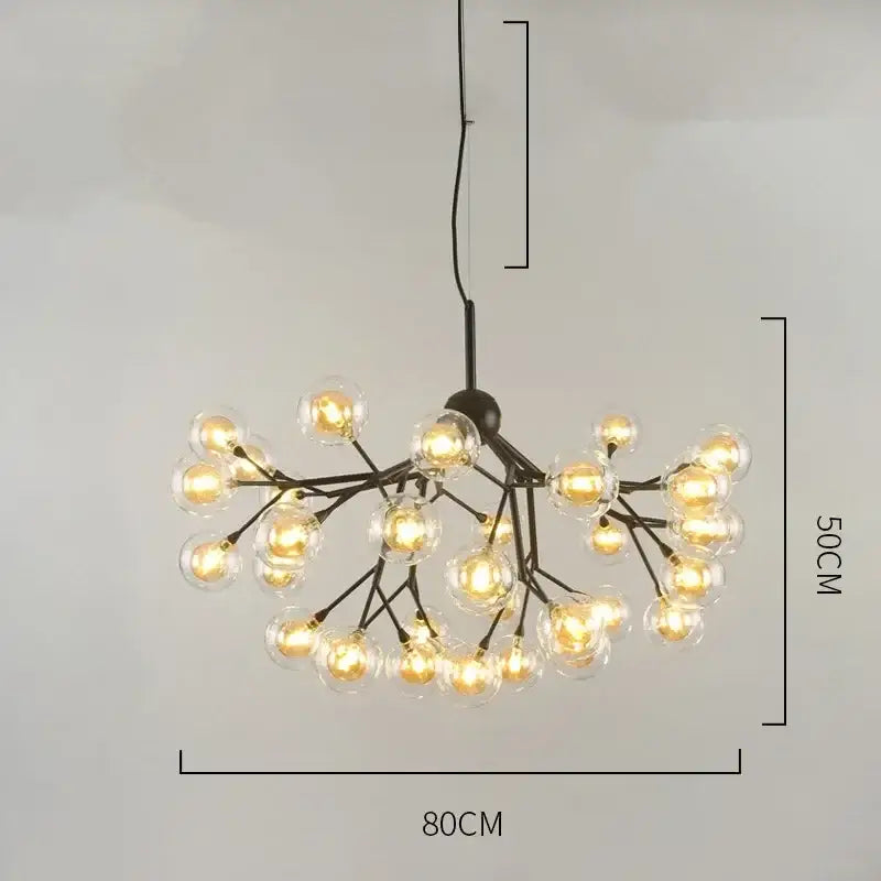 Black metal modern firefly glass round ball chandelier with clear globes in a branching design for dining room lighting