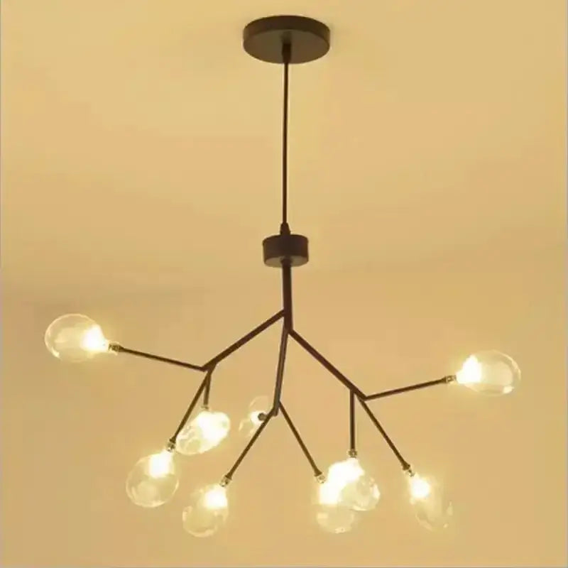 Modern firefly glass round ball chandelier with black metal frame and clear globe bulbs for dining room lighting decorbites heracleum firefly