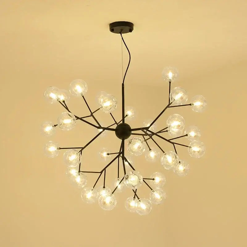 Black metal modern firefly glass round ball chandelier with clear glass globes in a branching design for dining room lighting
