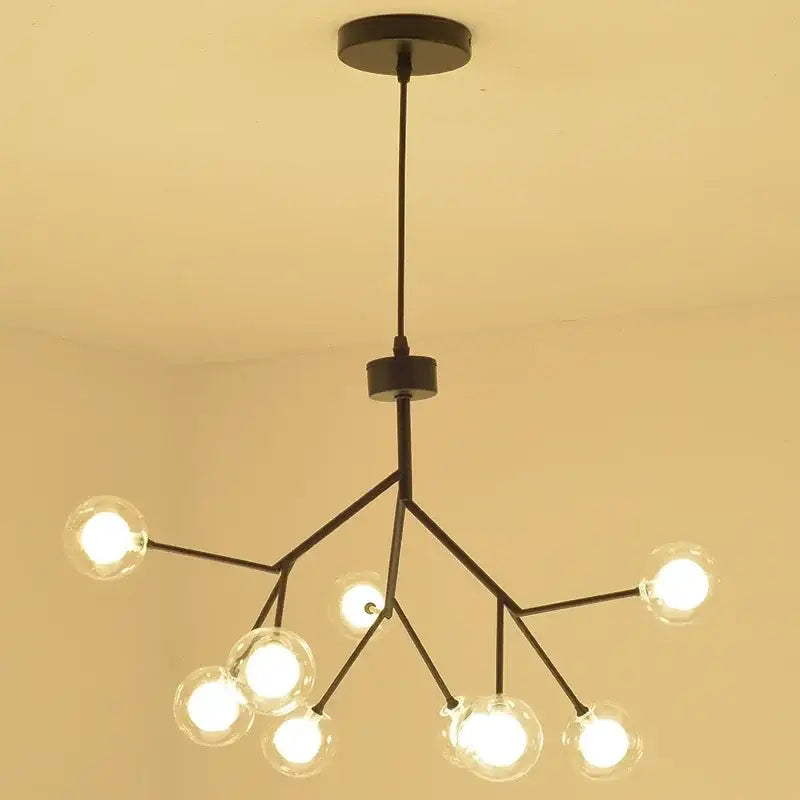 Black metal modern firefly glass round ball chandelier with clear globe bulbs for dining room decorbites heracleum firefly lighting