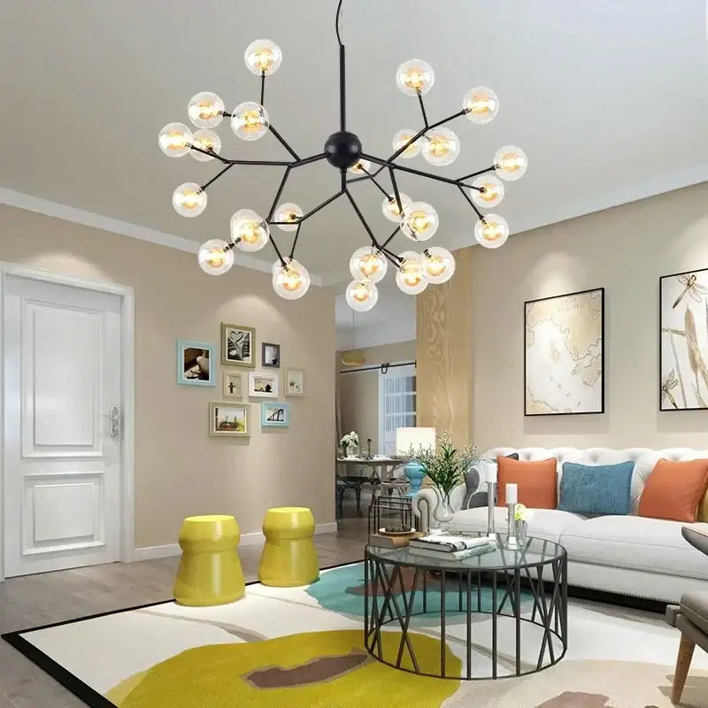 Black metal modern firefly glass round ball chandelier with multiple clear globe bulbs for dining room lighting decorbites heracleum firefly