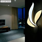 Modern flame simple acrylic led wall sconce with sleek layered design emitting neutral white warm and white warm light