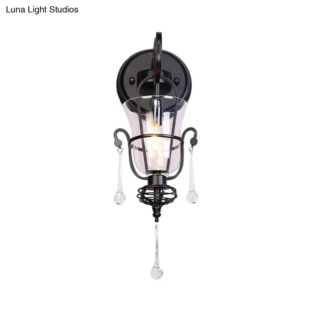 Modern flared black metal wall lamp with crystals featuring clear glass accents and dangling teardrop pendants for bedroom use