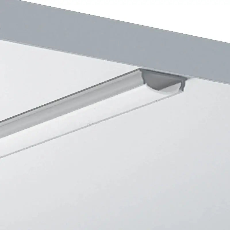Silver linear led strip light with sleek aluminum profiles for modern minimalist kitchen lighting installation