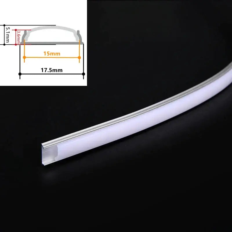 A sleek curved led strip light with translucent white body and silver aluminum profiles for kitchen use