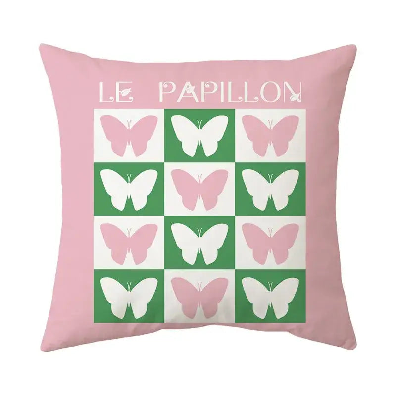 Pink decorbites butterfly pillowcase featuring a grid of pink and white butterfly silhouettes on green and white squares for living room decor