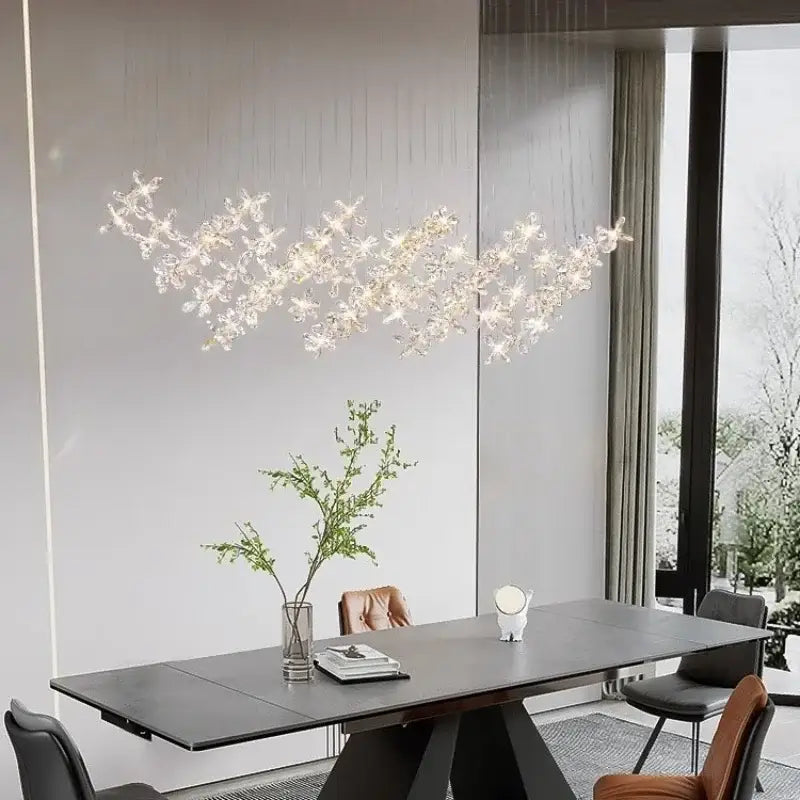 Elegant decorbites crystal led chandelier with delicate branching design emitting warm light for dining room decor