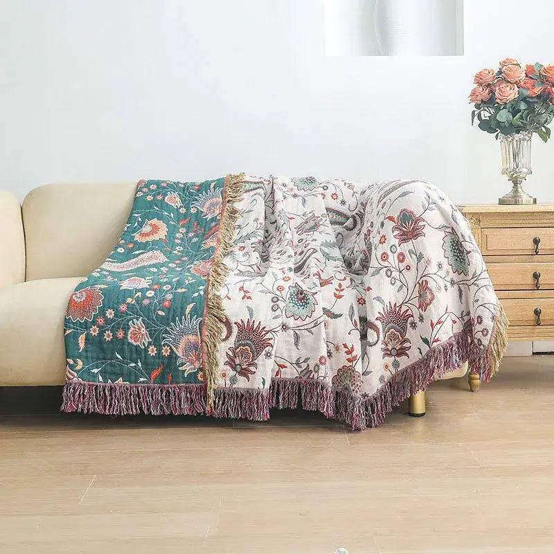 Modern floral teal and cream cooling cotton blanket with intricate botanical design and soft purple fringe by decorbites cooling cotton