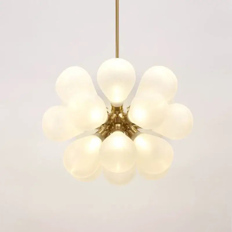 Modern floral teal glass ball pendant light with brass fixture and frosted globe bulbs for dining room decorbites glass ball
