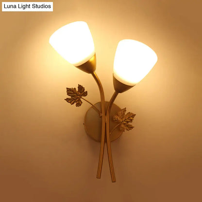 DecorBites™ DecorBites™ Modern Floral Wall Lamp: Milk Glass 2-Bulb Sconce Light in Black/Gold with Metal Leaf Accent