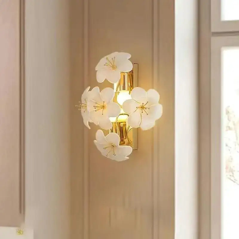 Elegant white ceramic cherry blossom pendant light with gold-toned metal finish for practical illumination in kitchens
