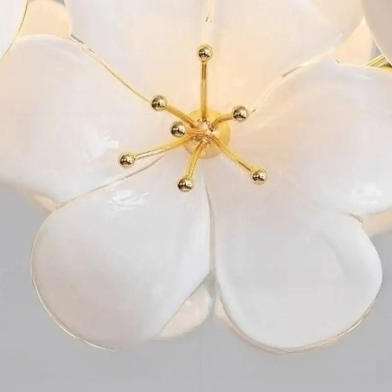 Modern floral white and gold pendant light with a metal finish and practical illumination for kitchen use