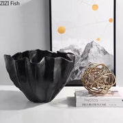 Black ceramic bud vase with fluted petal-like rim and glossy finish for modern decorbites black resin floral decor
