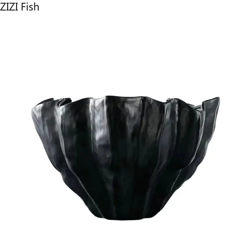 Black glossy ceramic bud vase with sculpted leaf rim and ribbed interior for modern decorbites black resin decor