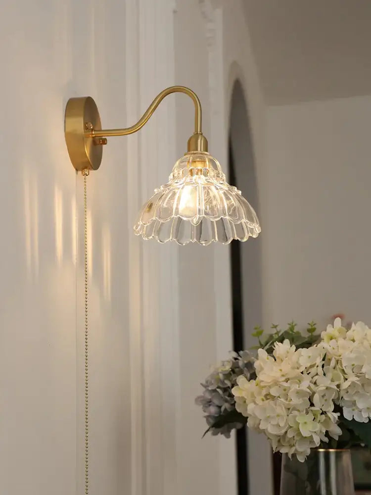 A modern fluted brass glass pendant light with a delicate clear glass shade for dining room decorbites brass glass