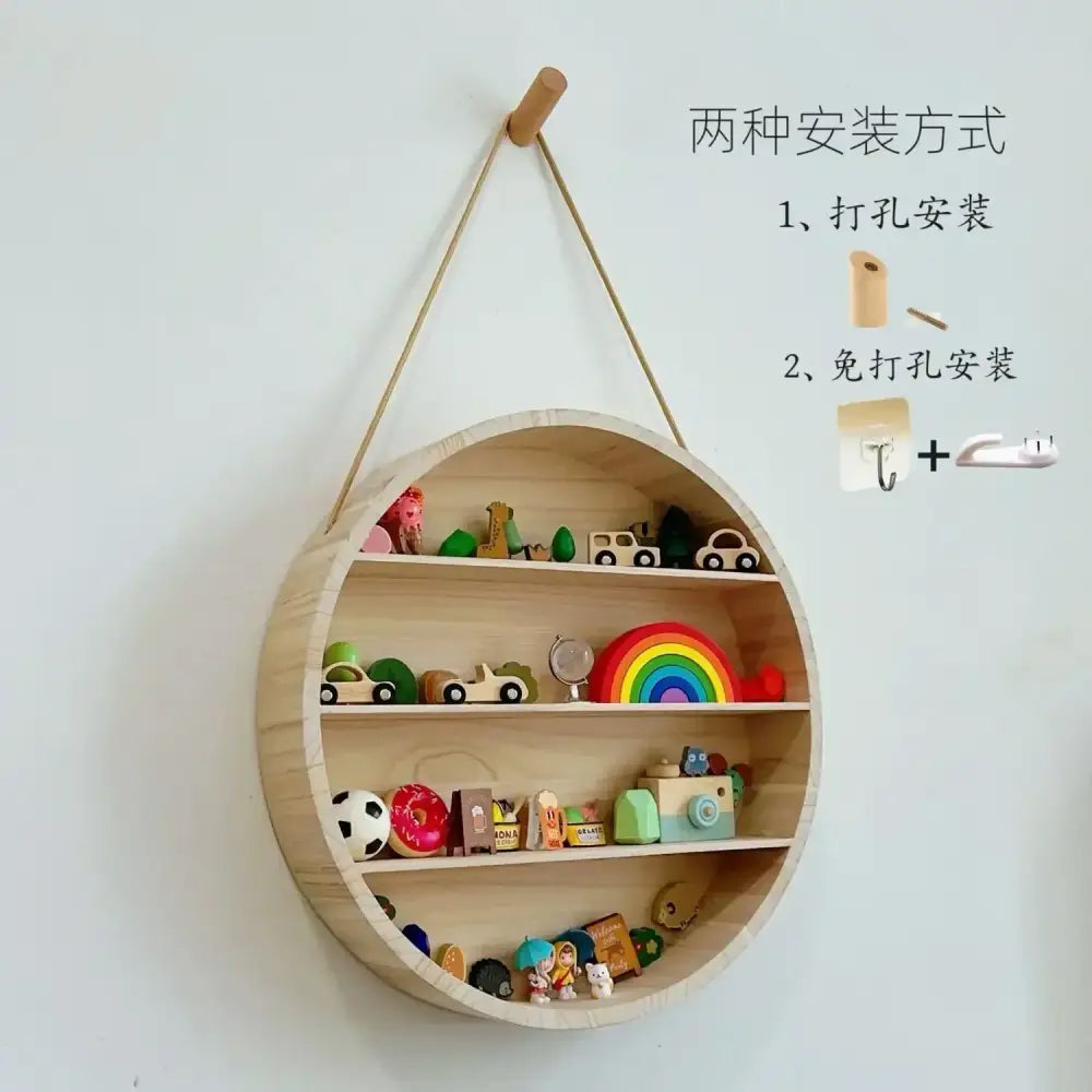 Light-colored modern four tier circular wooden frame wall shelf with three shelves and hanging rope attachment