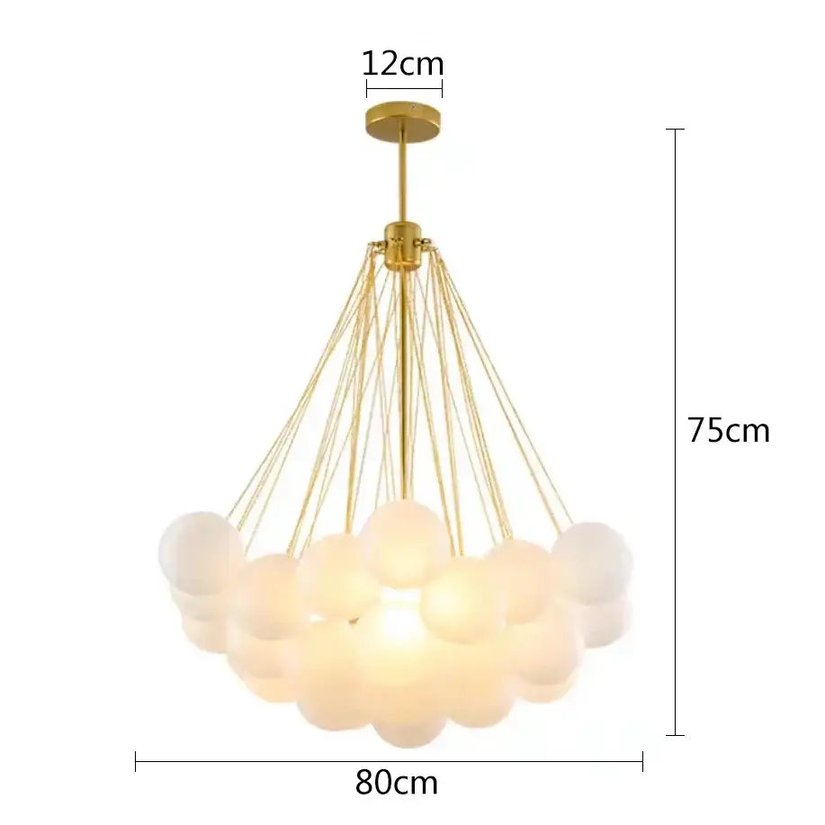 Modern frosted glass ball cloud pendant lights with gold-toned chandelier and frosted glass spheres for dining room