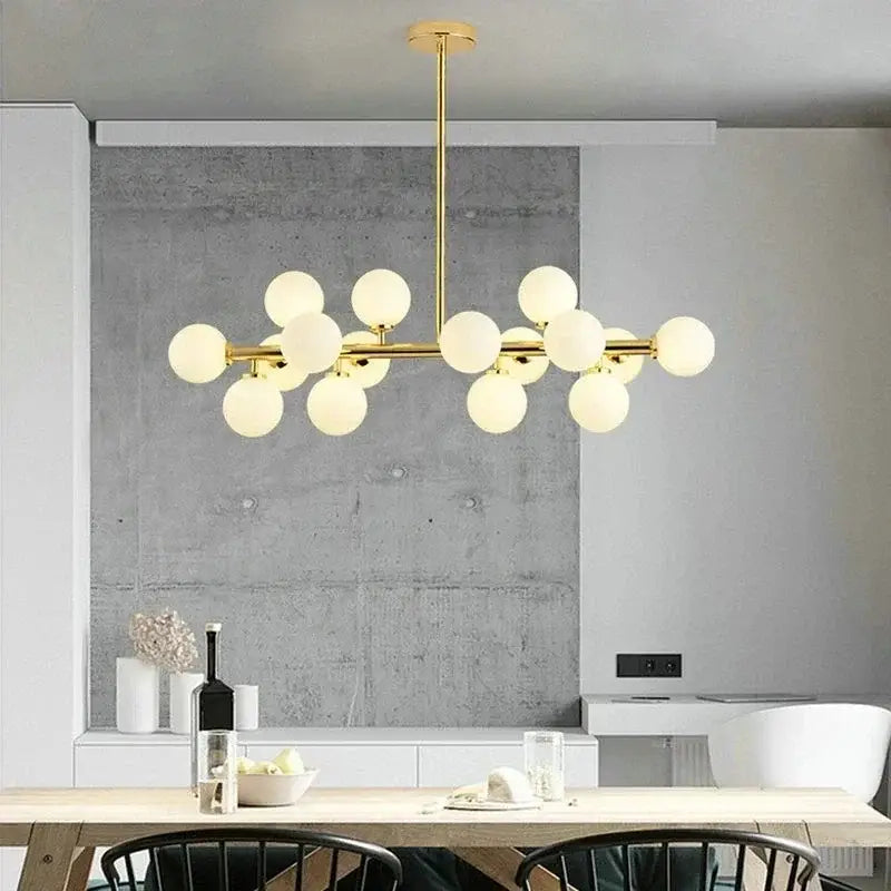 Gold-toned modern frosted glass ball led chandelier with branching design for dining room decorbites glass ball pendant light