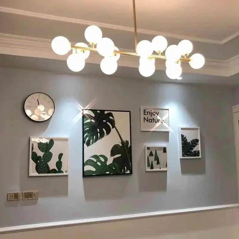Modern frosted glass ball led chandelier with gold-toned frame and white glass bulbs for dining room decorbites glass ball lighting