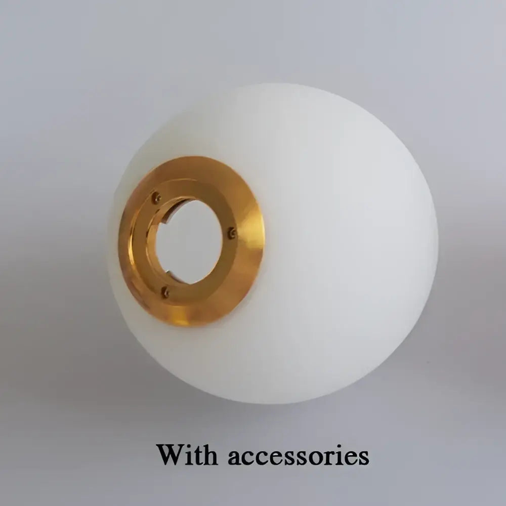 Modern frosted glass ball pendant light with white spherical glass ball and gold-toned metal ring for bedroom decorbites glass ball