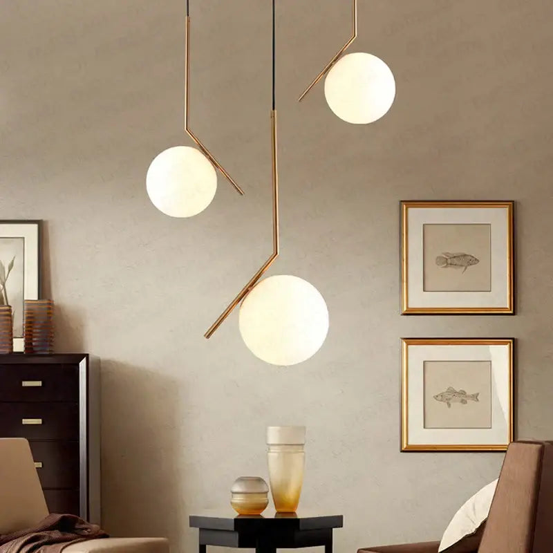 Modern brass pendant lights with spherical frosted glass shades featuring gold ring for bedroom decorbites glass ball pendant