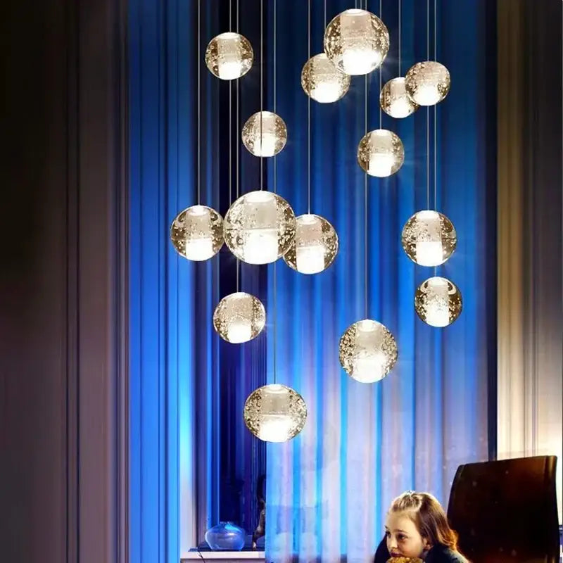 Modern frosted glass crystal ceiling chandelier with spherical orbs and warm lighting for decorbites crystal ceiling use