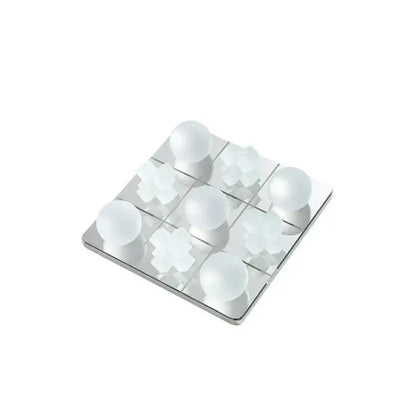 Modern frosted glass geometric tic tac toe set with silver board and frosted white spherical and cross pieces decorbites frosted glass